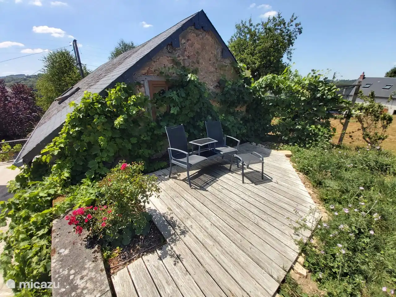 Sun terrace overlooking the meadow behind the house