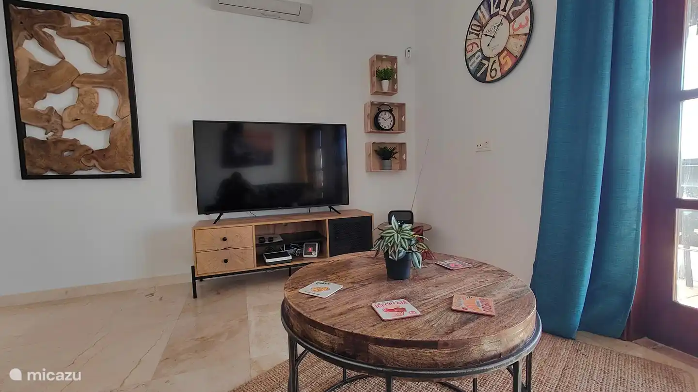 Cozy sitting and TV corner. Watch the TV channels from your home country!