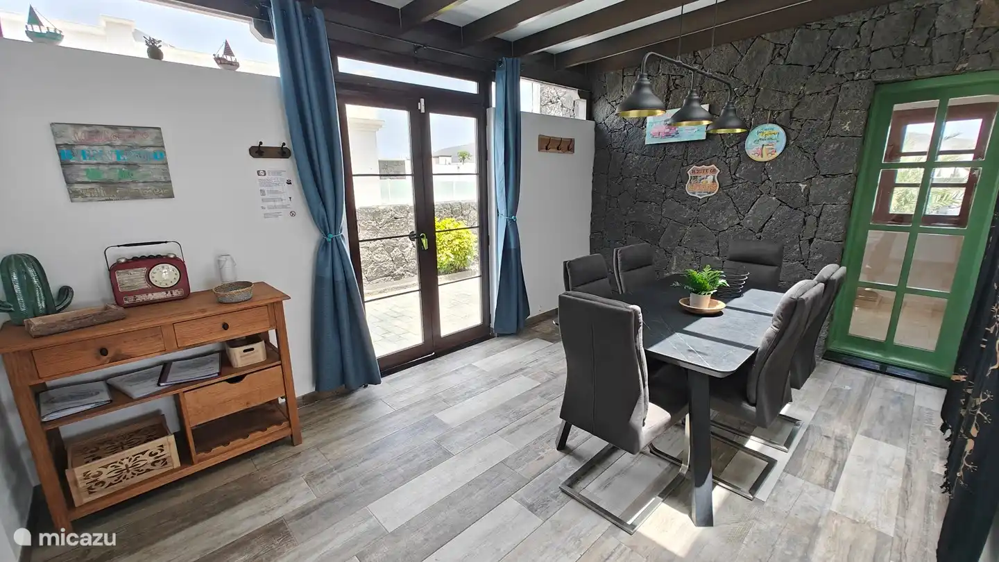 The modern and comfortable dining area with lots of daylight.