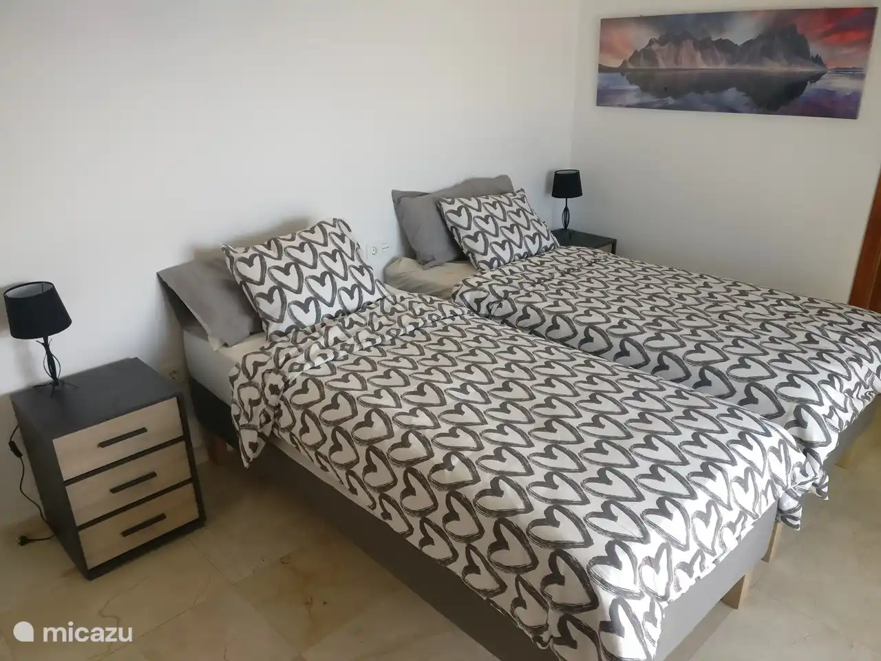 Twin bedroom ground floor overlooking the spacious terrace and swimming pool