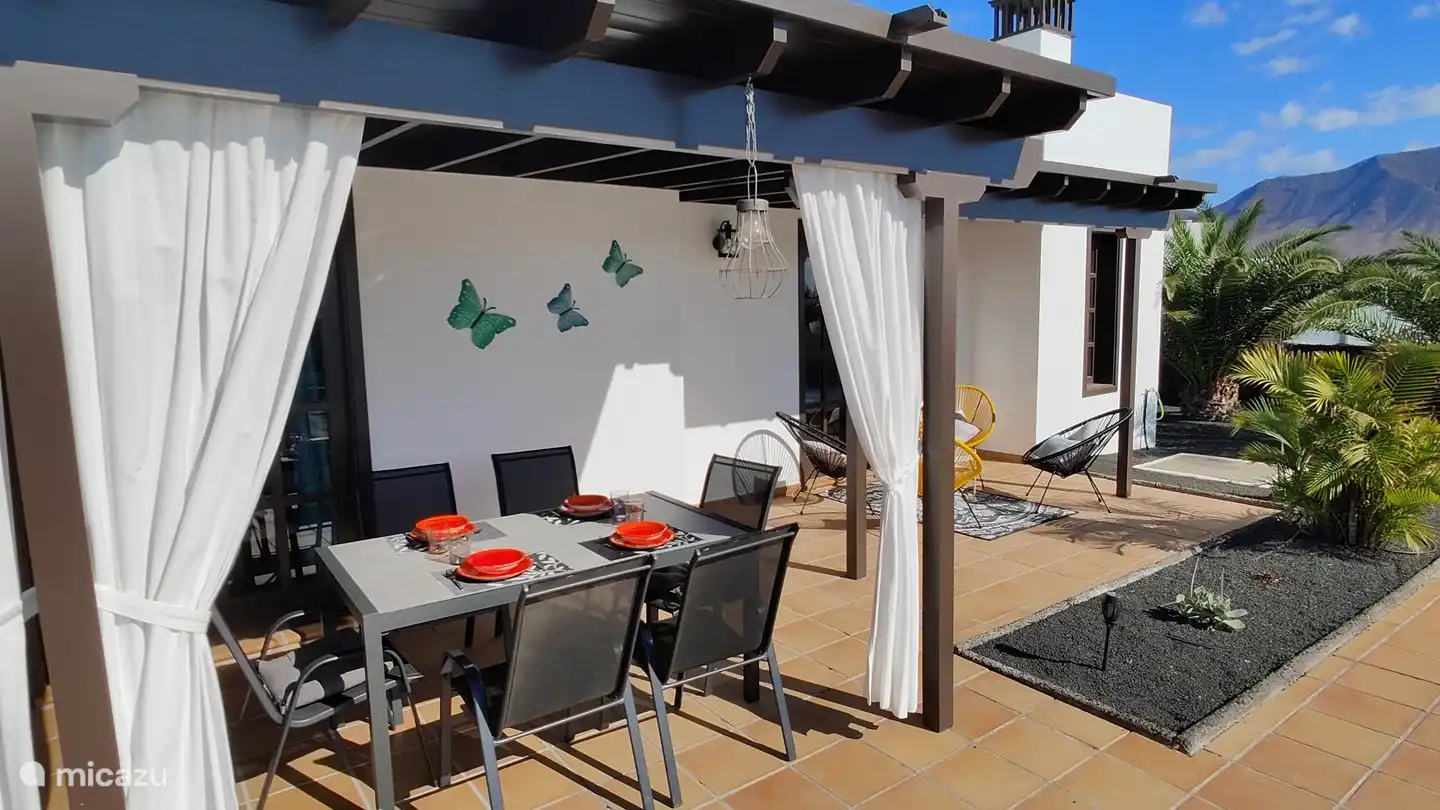 The dining table overlooking the pool