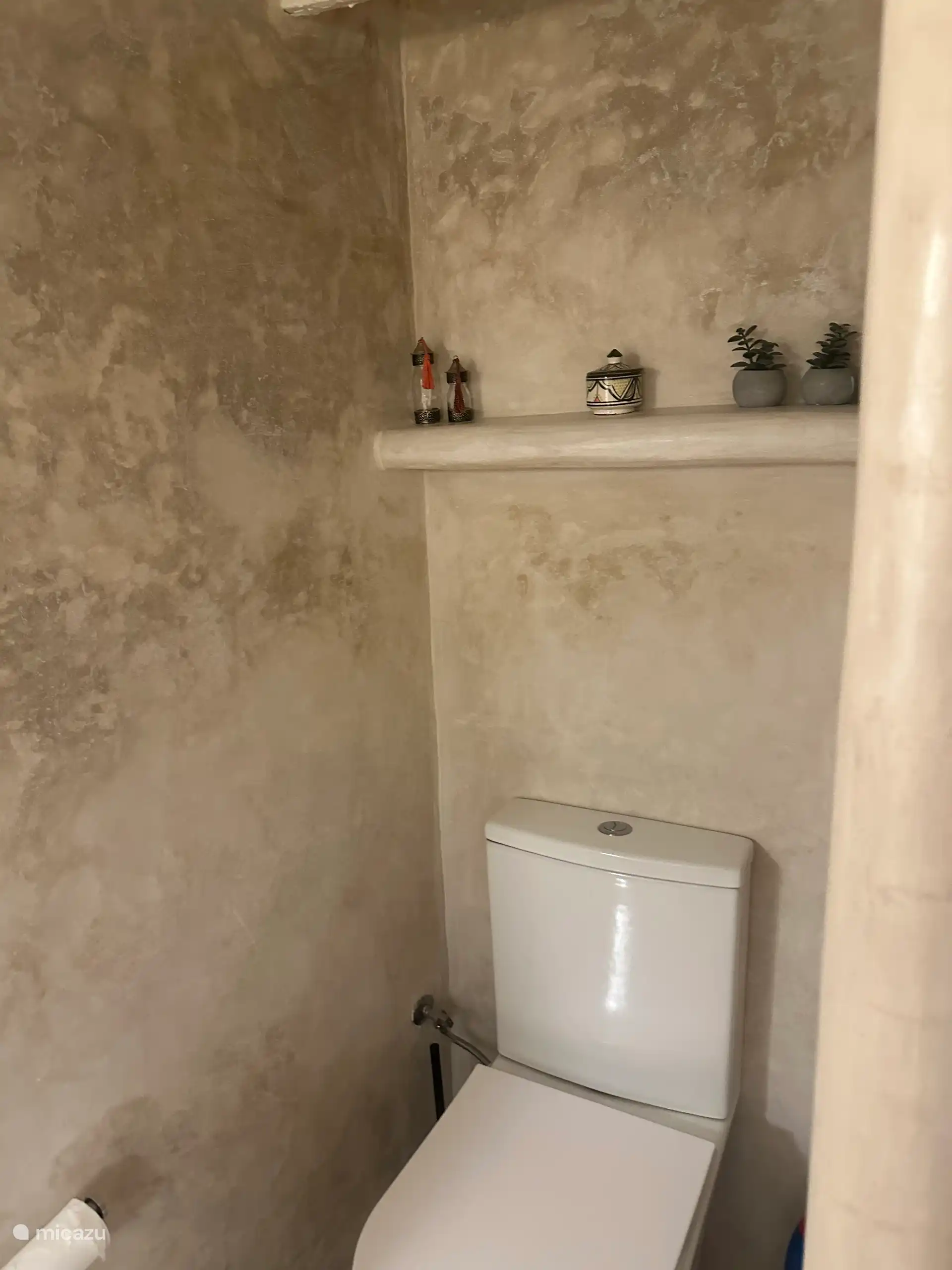 The bathroom with beautiful authentic stucco