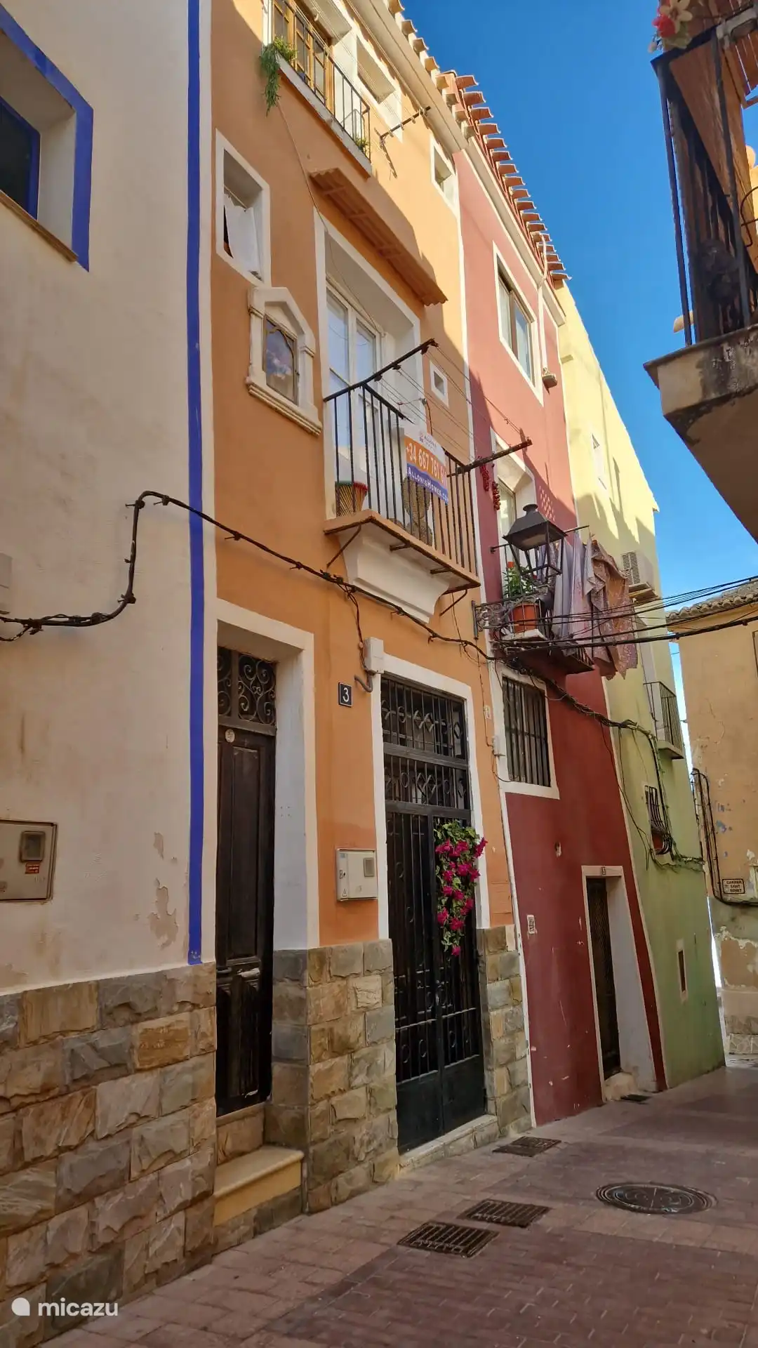 The front of our house, the orange house