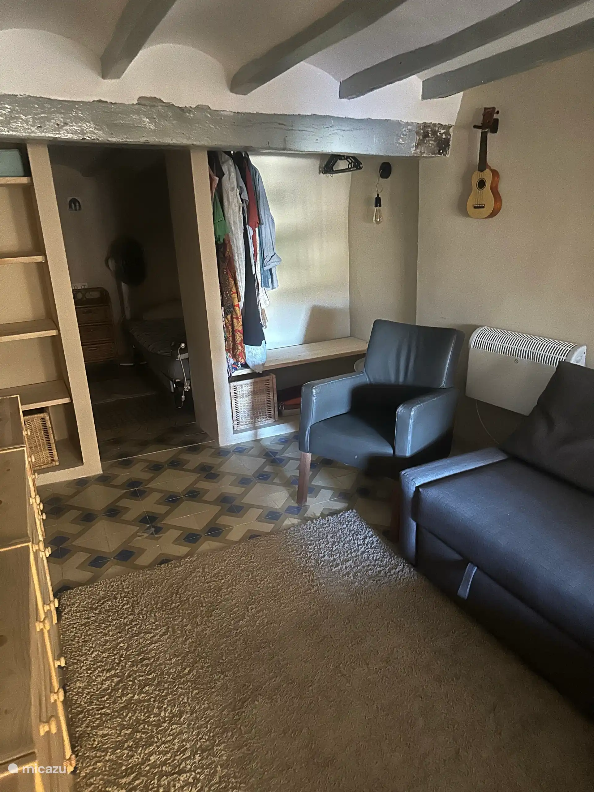 The loft with the bedroom behind it