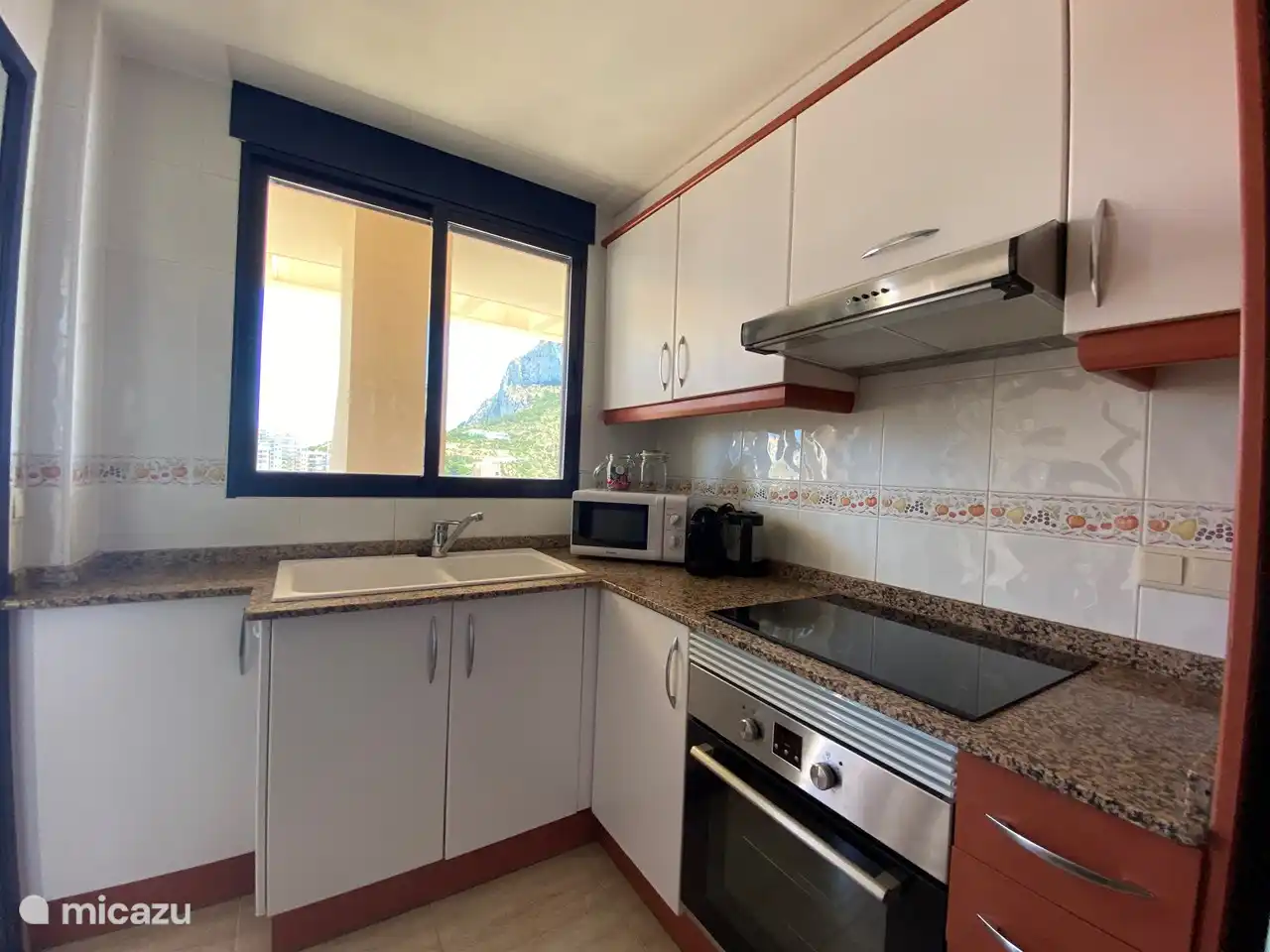 The kitchen, from behind the double sink also a beautiful view!