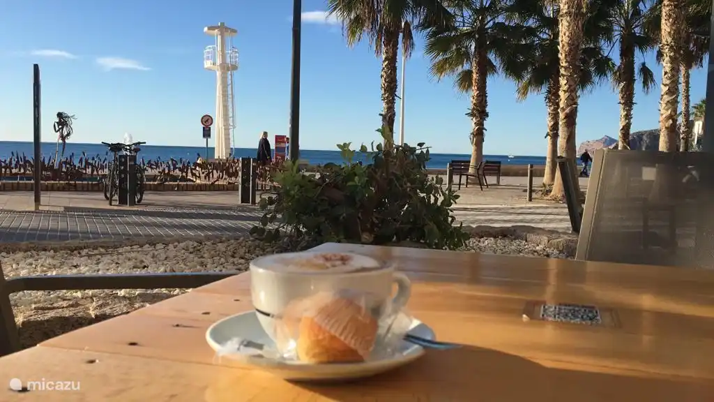 Just a terrace in the city on the boulevard with a view of the sea.