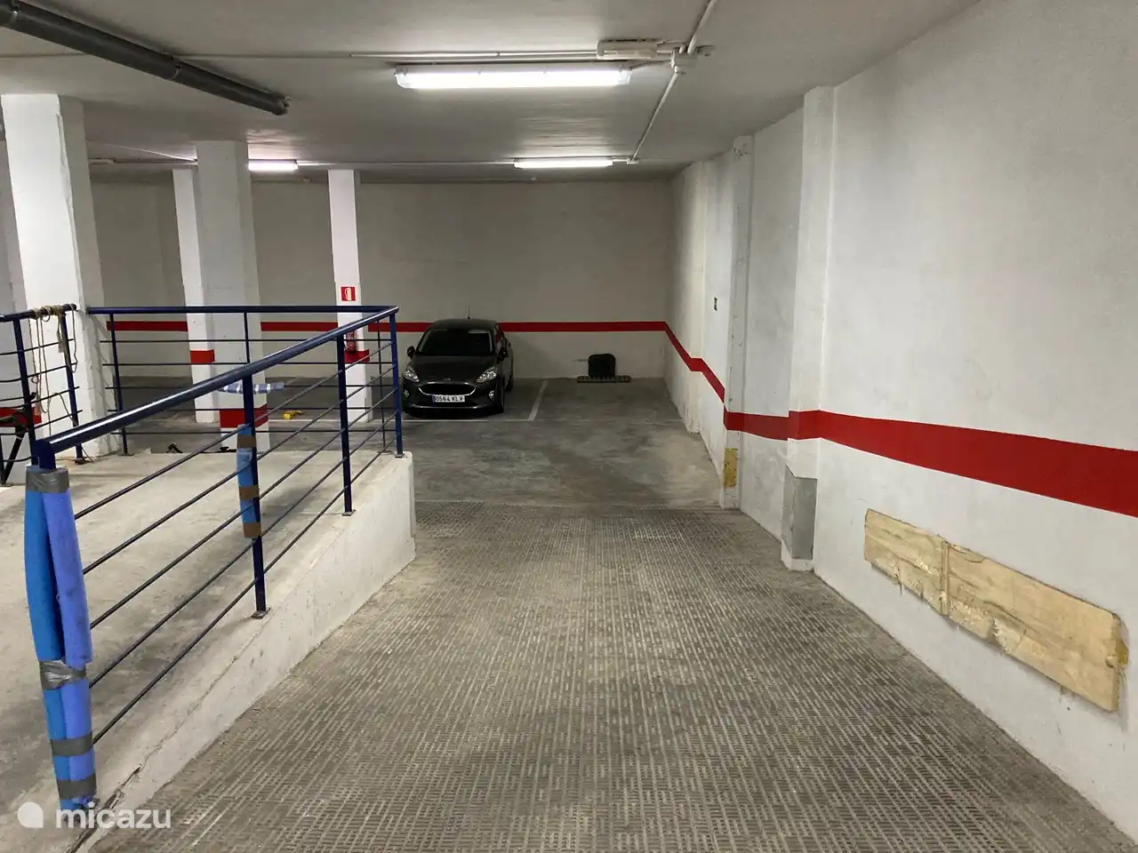 The slope to the parking lot.