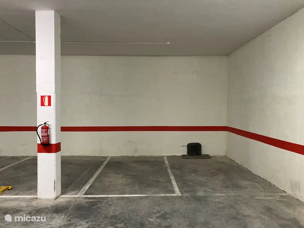 The parking lot (left).