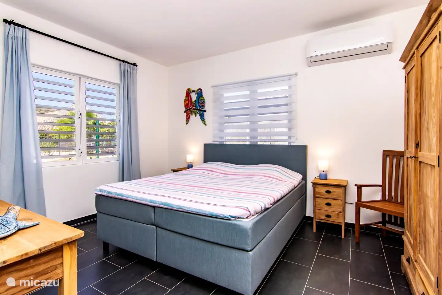 Dormitorio 1 con cama box spring de 1.80x2.00 y baño privado