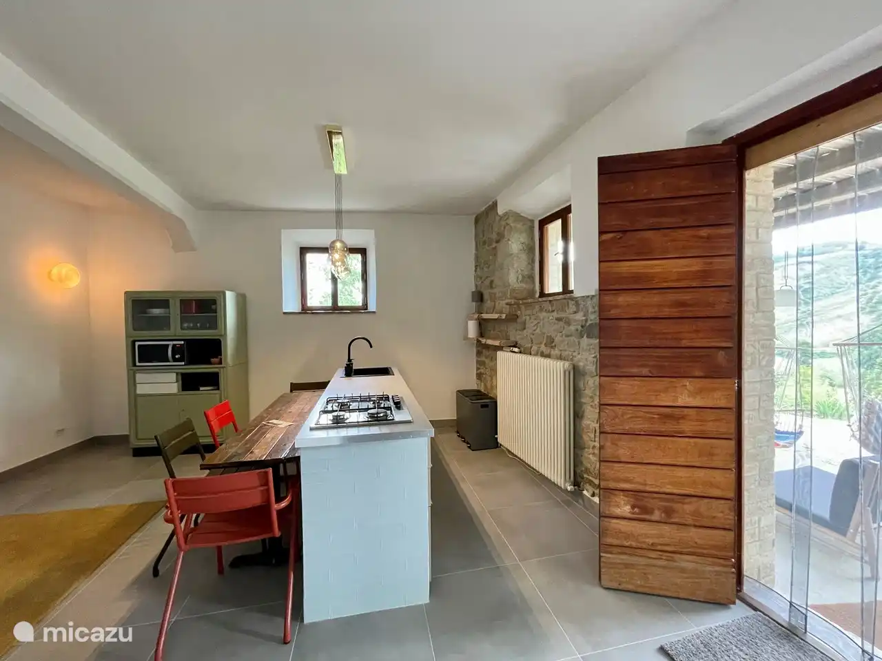 The living room with patio doors to the terrace