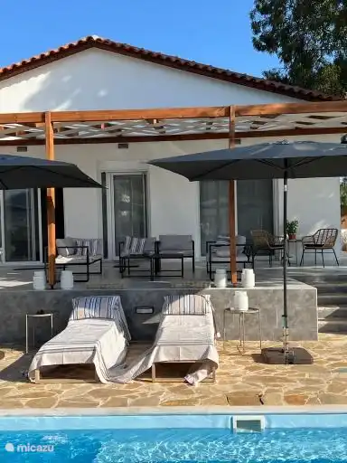 Start your day with a swim in your private pool with a sea view