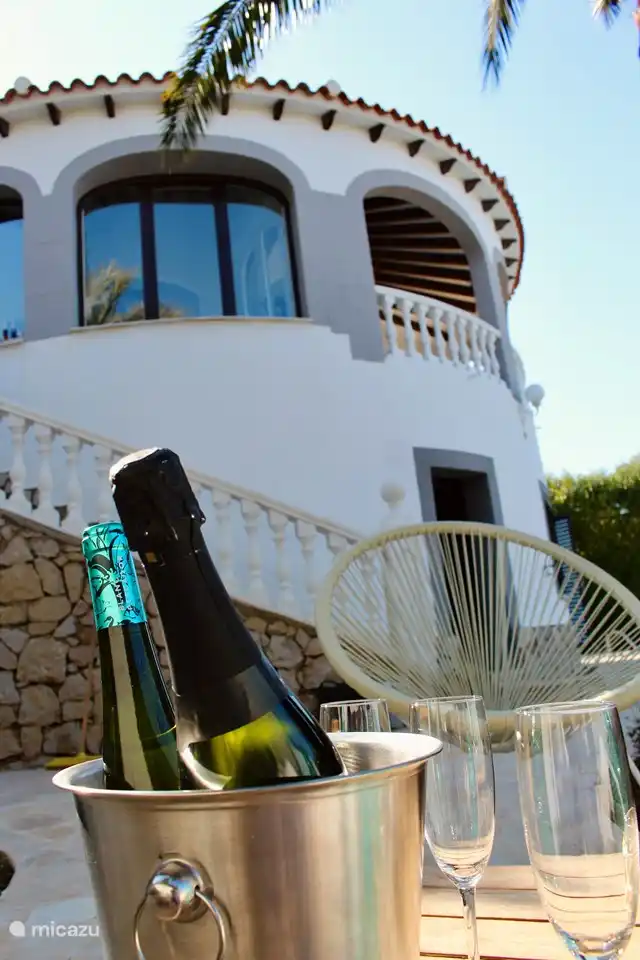 Drink on the lounge set.