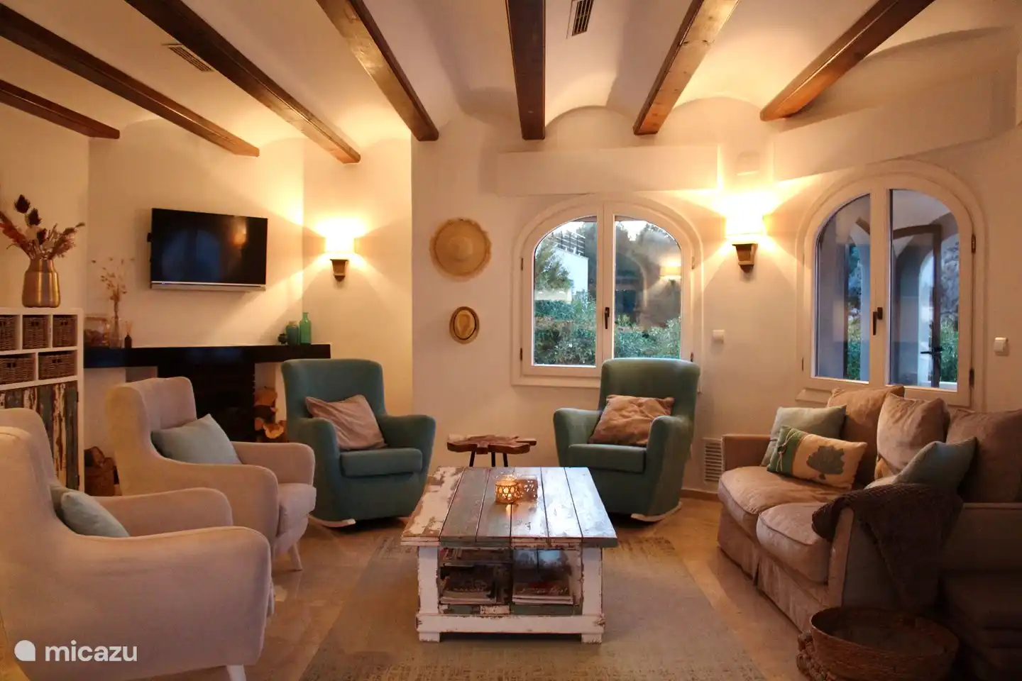 The living room with nice chairs and a comfortable sofa. (1/2)