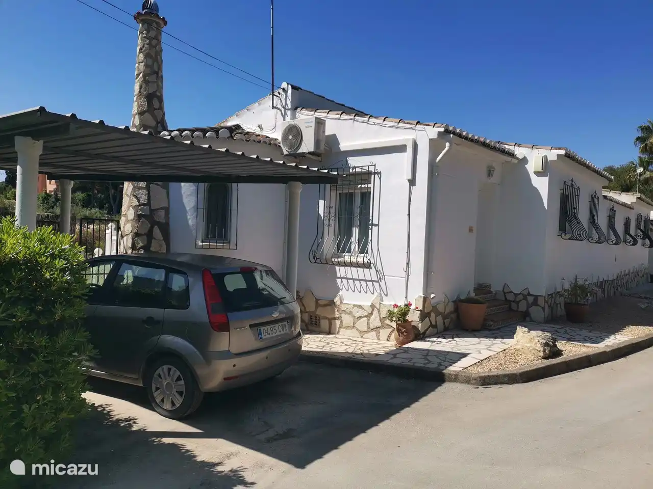you can park your car covered next to the bungalow under the carport