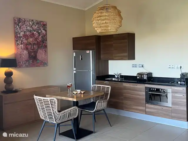 Quartier Jan Thiel | appartement B7 | Curaçao, Banda Ariba (est), Spaanse Water - appartement Cuisine ouverte avec cuisinière électrique et machine à café Nespresso.