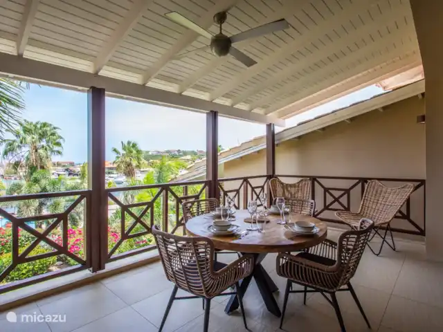 Quartier Jan Thiel | appartement B7 | Curaçao, Banda Ariba (est), Spaanse Water - appartement Balcon ombragé avec vue sur les eaux espagnoles.