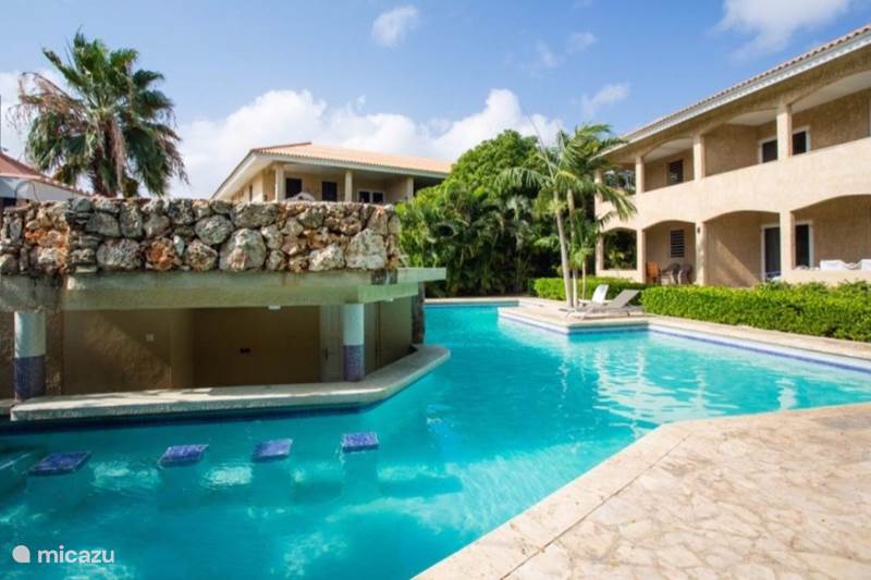 Vakantiehuis Curaçao, Banda Ariba (oost), Cas Grandi Appartement Cocobana Resort app 2 begaande grond