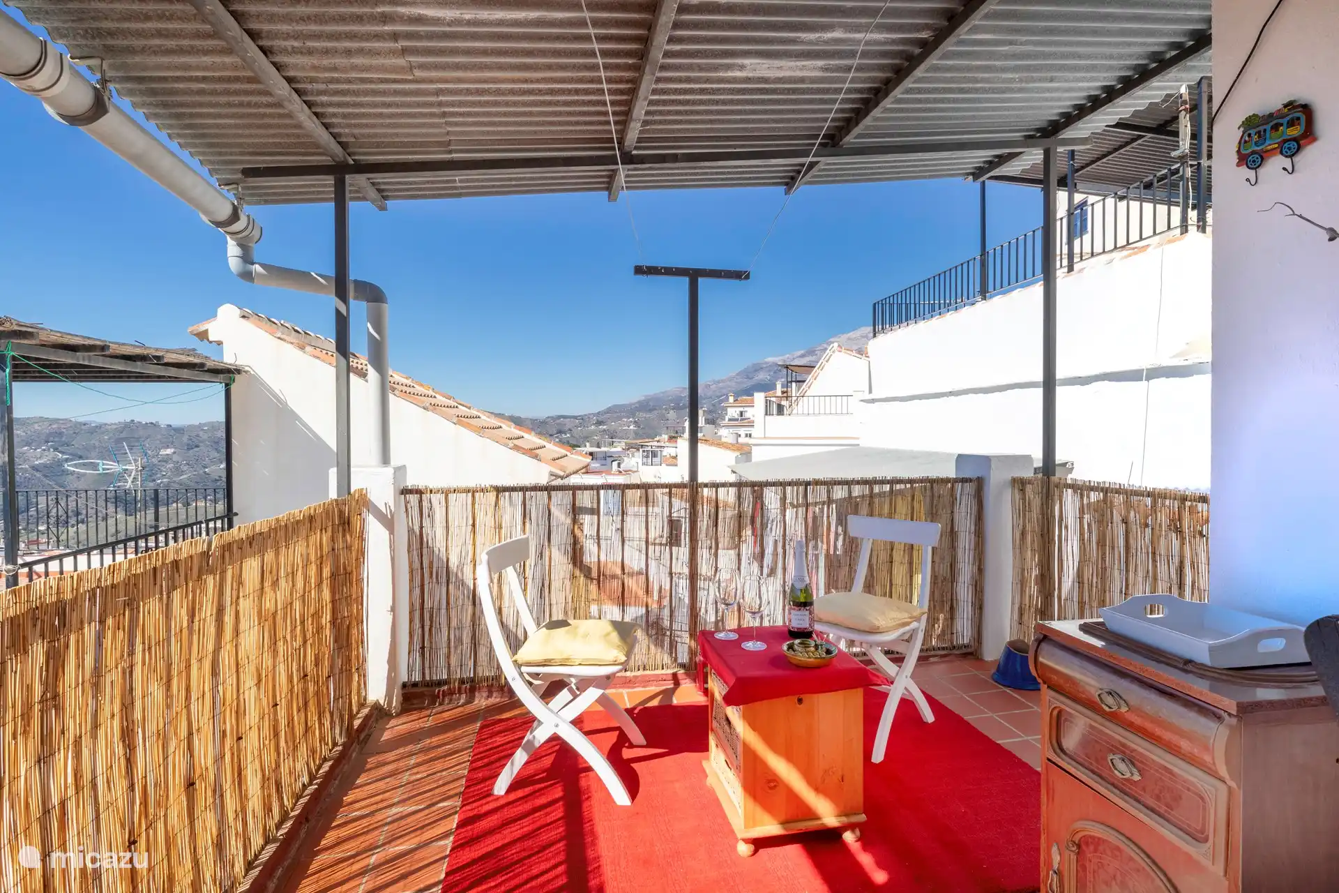 Intimate spot on the covered terrace.