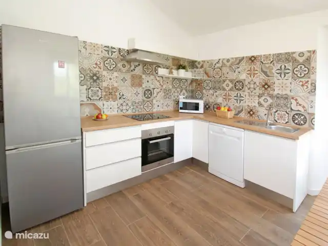 Casa Maria huren in Spanje, Costa del Sol, Comares - vakantiehuis Ongeveer in het midden van de foto ziet u de vrijwilliger die de afwas gaat doen.