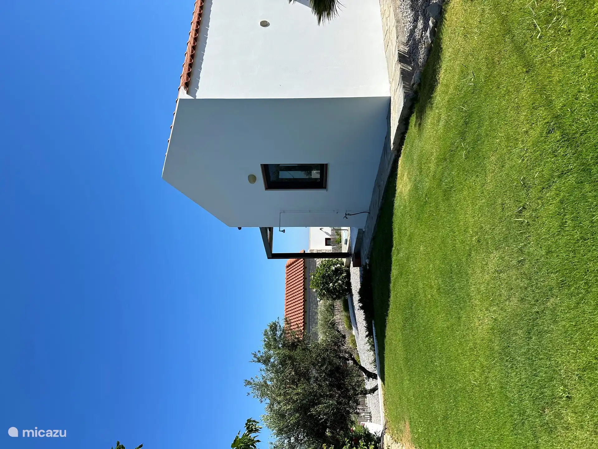 Zij aanzicht van het huis.