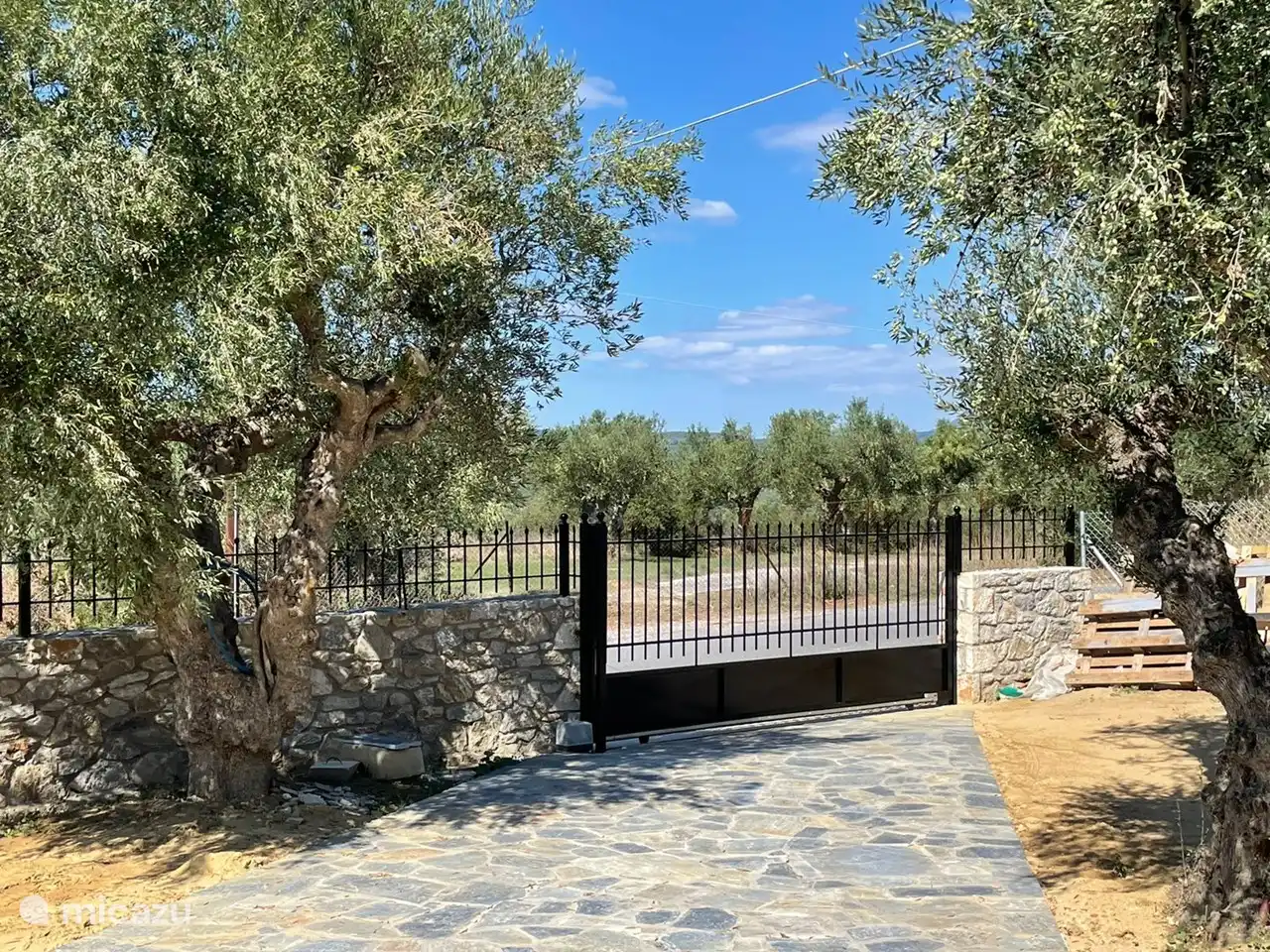 Driveway with electronically operated gate