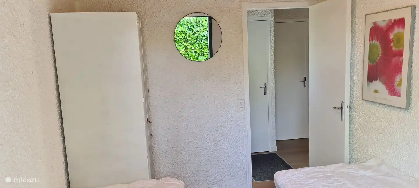 (children's) bedroom with 2 single beds and spacious wardrobe