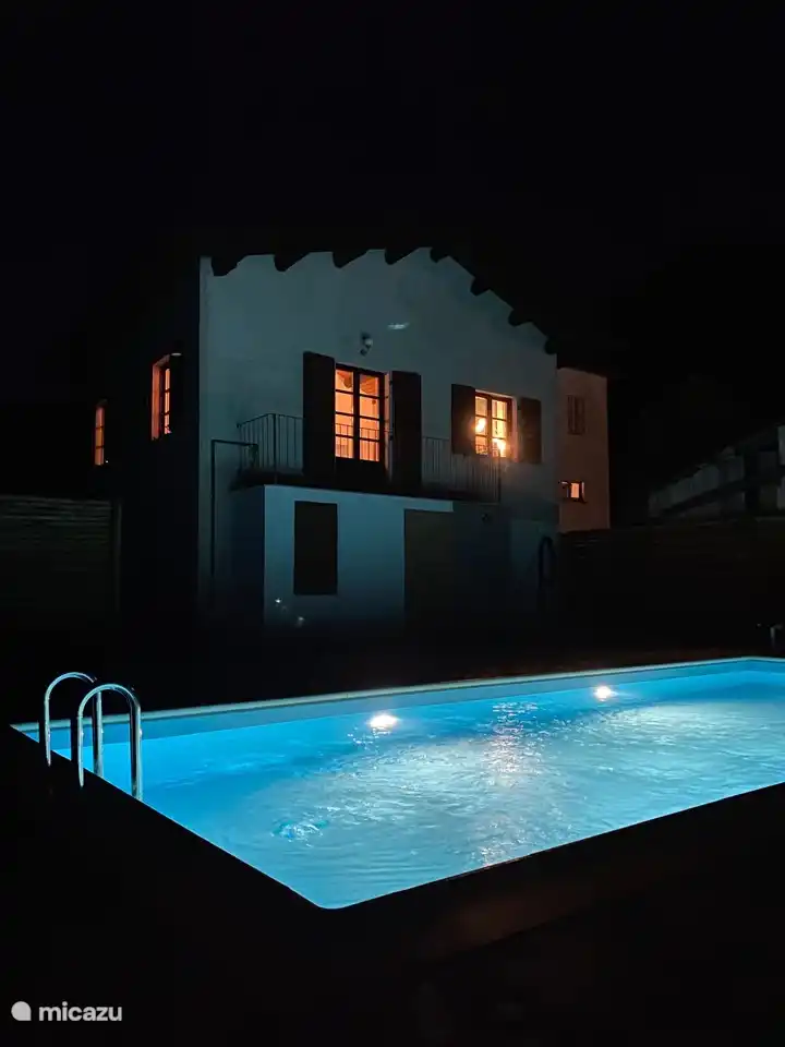 Our pool at night. Together with the hot tub and the sauna a real wellness paradise.