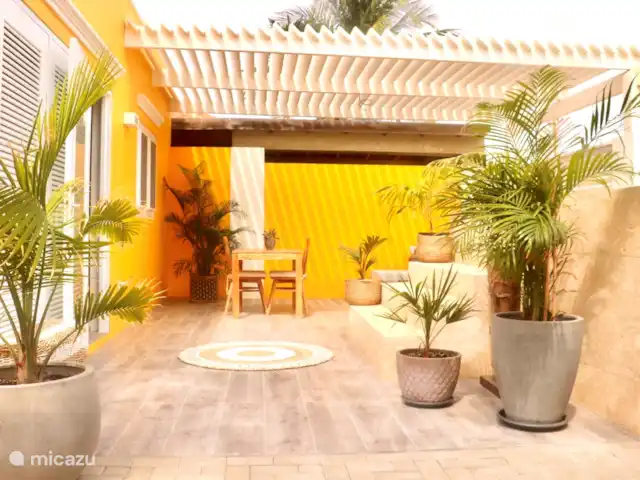 Location de Vacances Aruba, Nord, Nord, maison de vacances - Casita de luxe avec piscine privée Coin repas à l'ombre