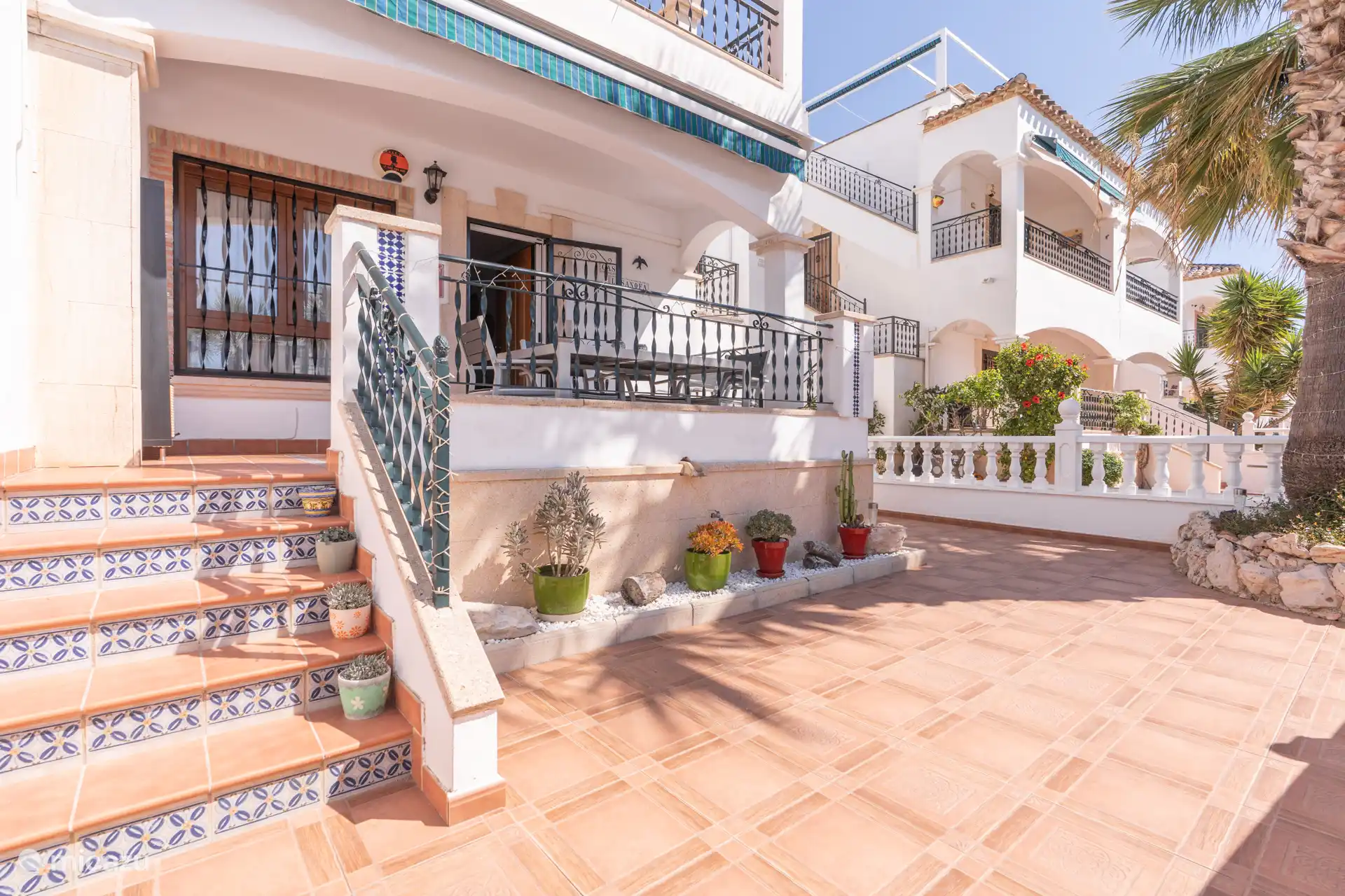 Jardin rez-de-chaussée et balcon