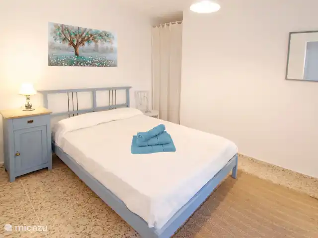 Location de Vacances Espagne, Costa del Sol, Comares, maison de vacances - La Zorzalera La chambre bleue avec un lit double.