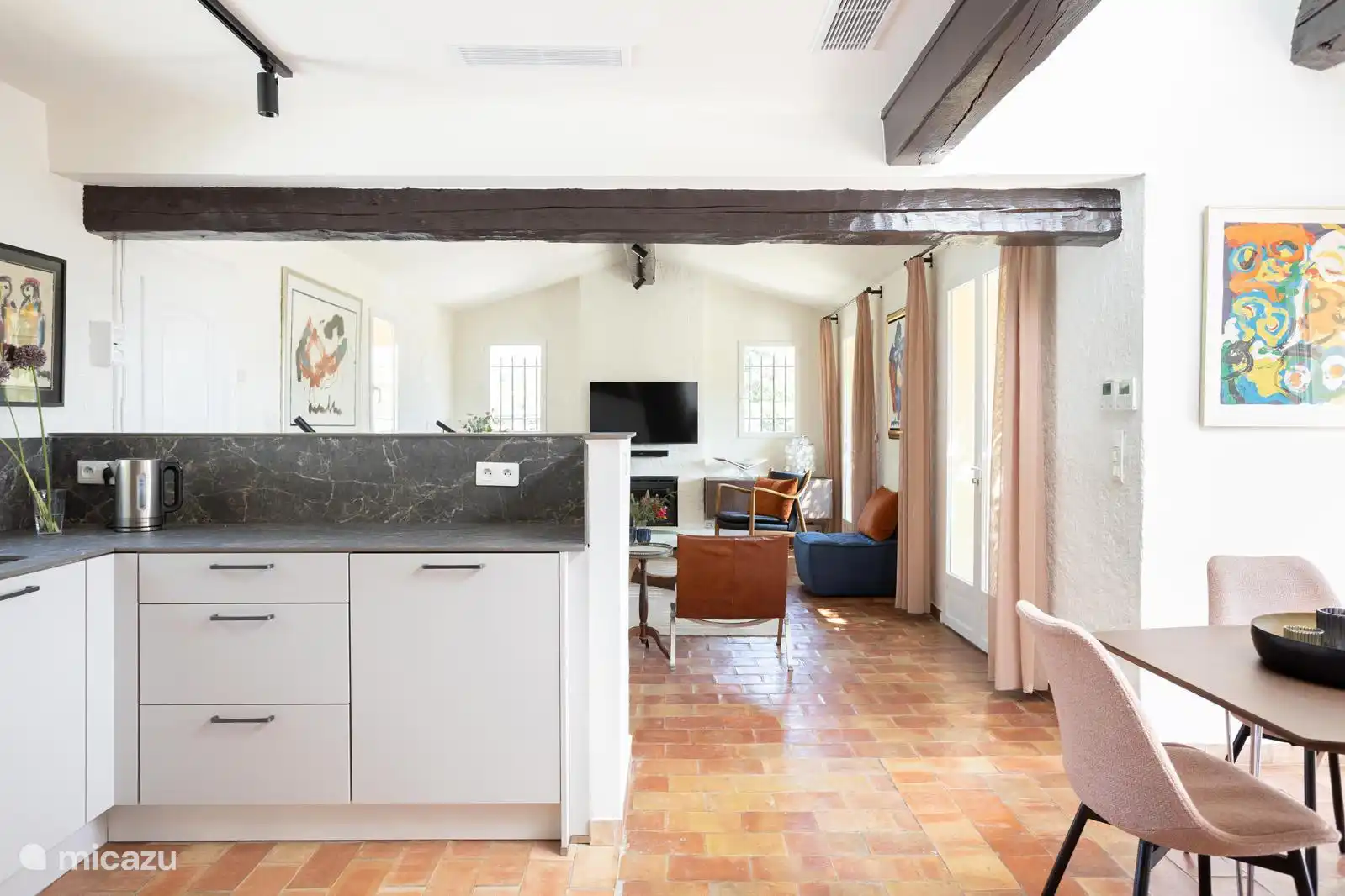 The living room, dining room and kitchen are connected to each other