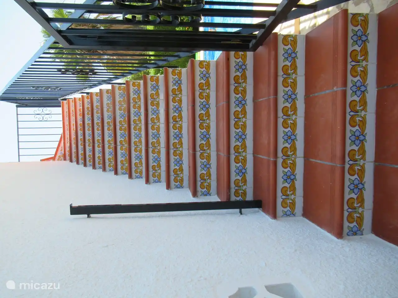 Stairs from pool to veranda