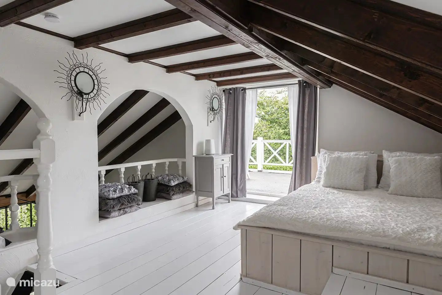 bedroom with a double bed 160x200 on the 1st floor and also access to the roof terrace. with patio doors.