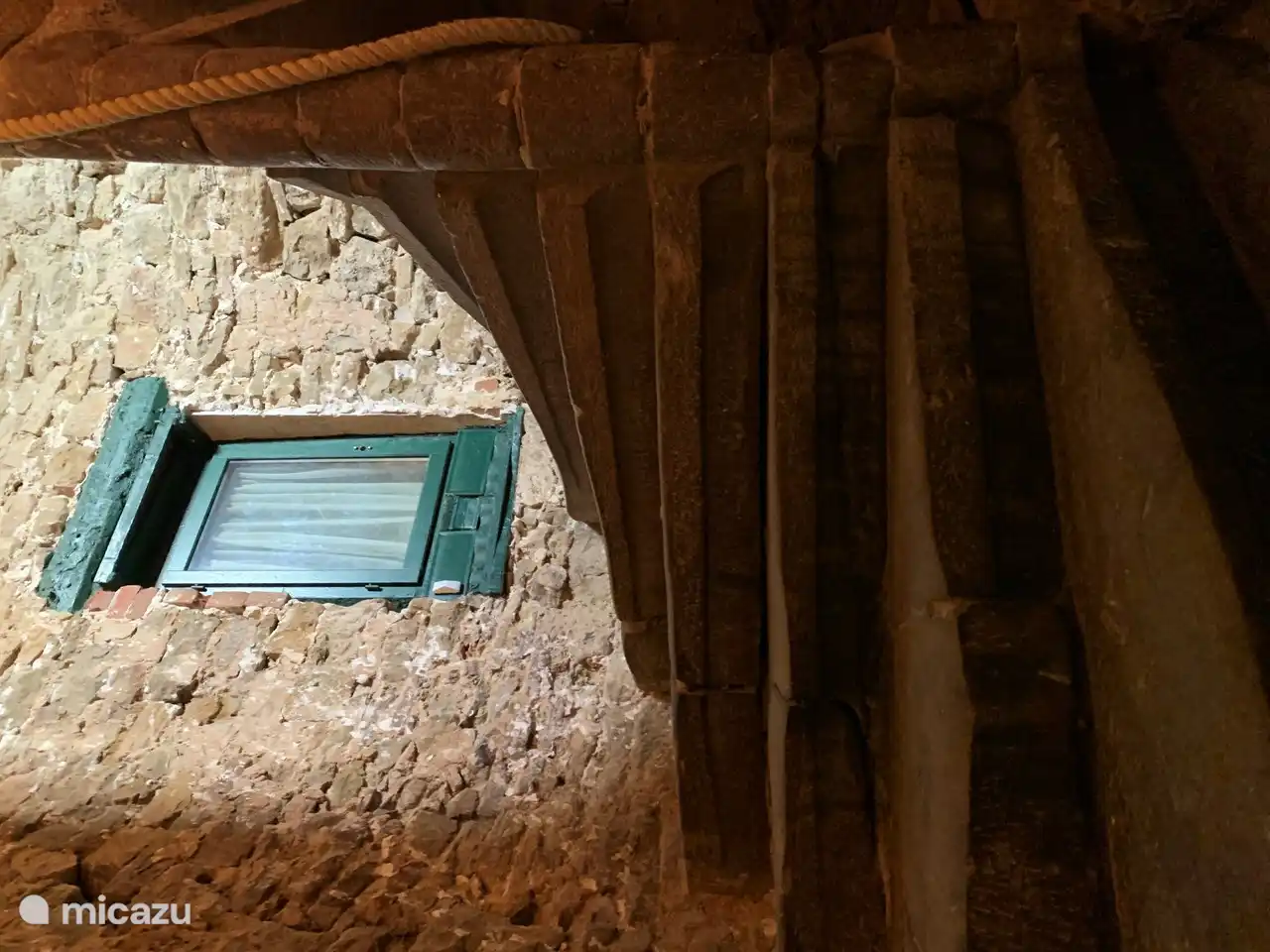 Stone spiral staircase in the house