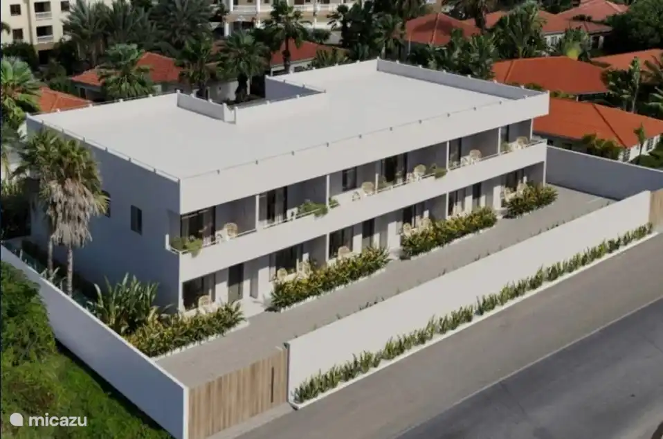 L’avant avec ton appartement au rez-de-chaussée. 