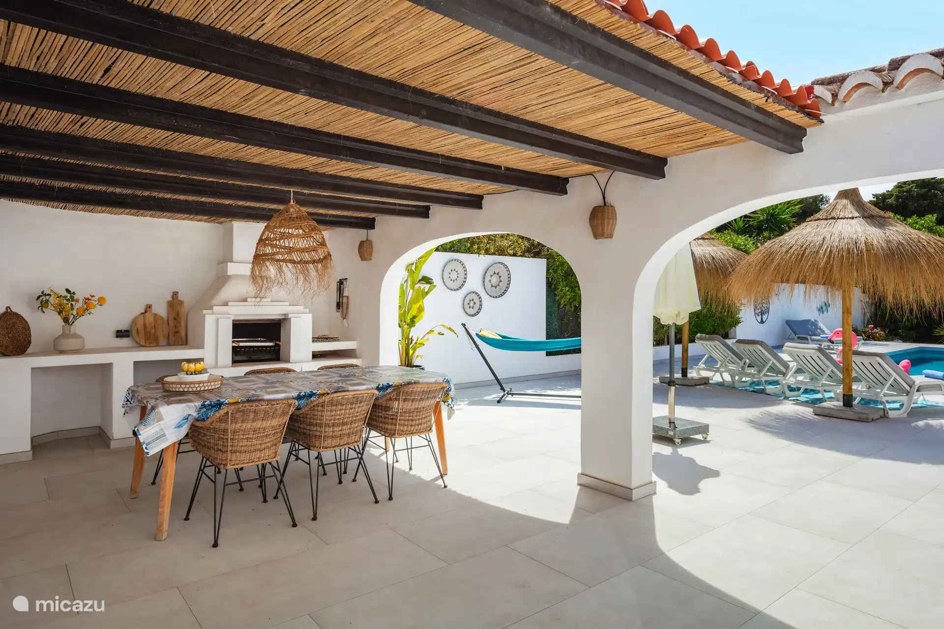 Outdoor dining table with barbecue