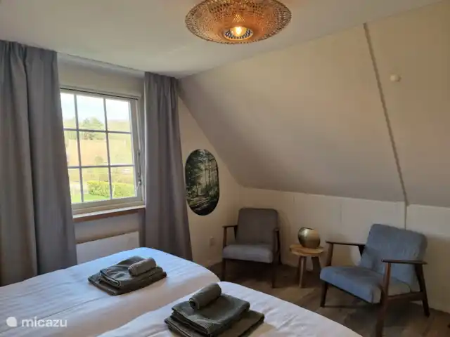 Huisje Weidezicht ● Achterhoek huren in Nederland, Gelderland, Lievelde - vakantiehuis Slaapkamer met zicht op het park