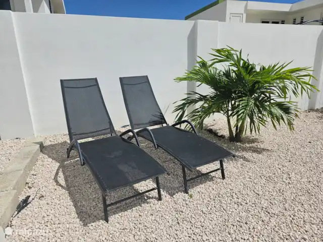 Location de Vacances Curaçao, Curaçao-Centre, Souax, maison de vacances - Na Wechi mi ta: Maison de vacances Curaçao Chaises longues de jardin