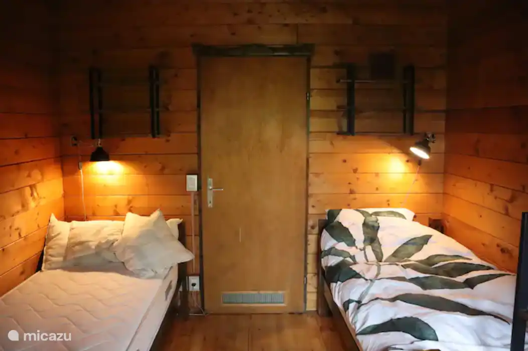 Schlafzimmer 3 mit zwei getrennten Einzelbetten