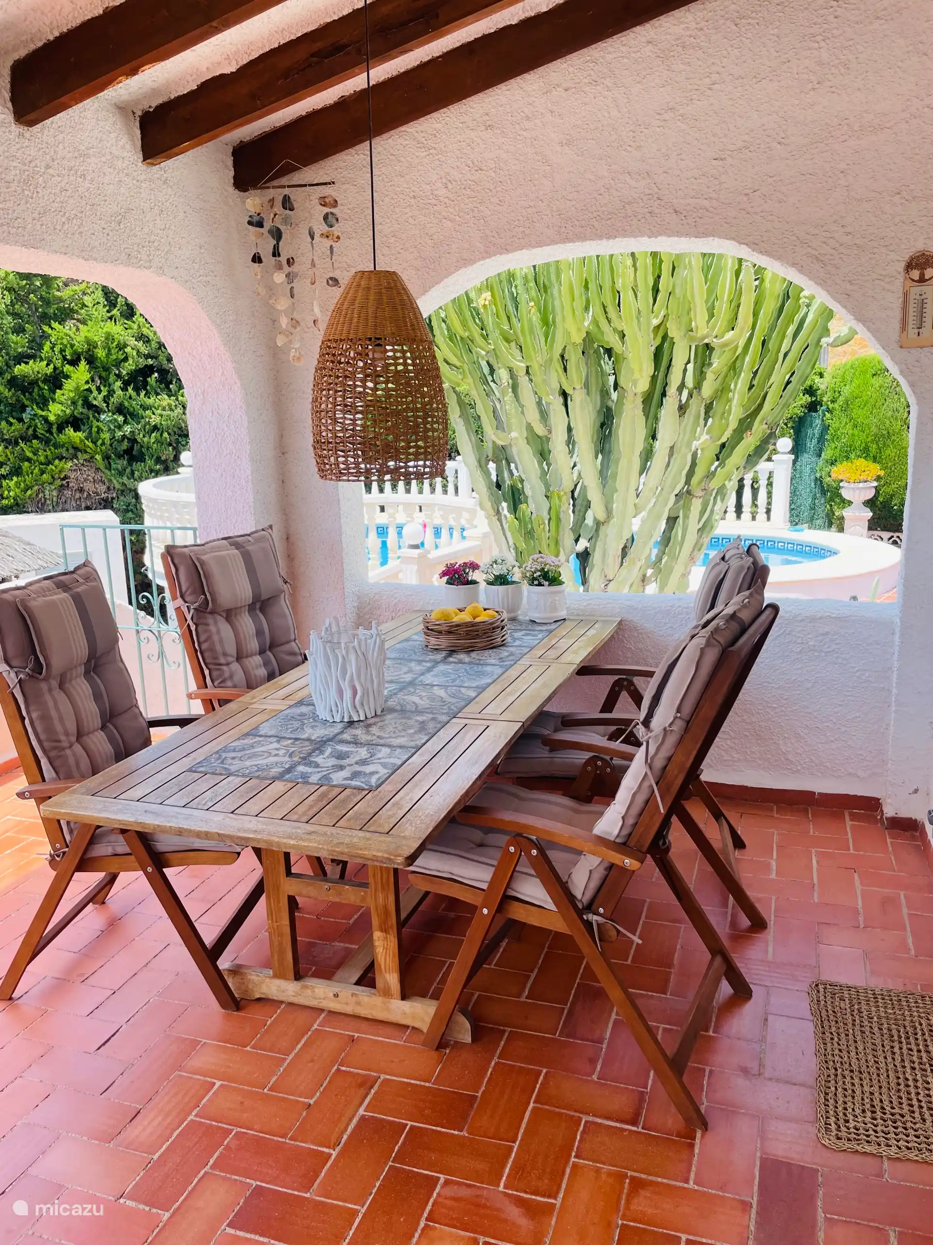 Covered naya overlooking the pool