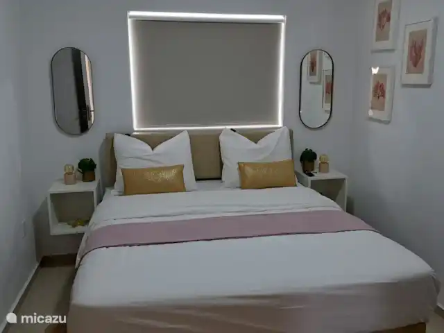 apartamento en Curazao, Banda Arriba (este), Cas Grandi – Apartamento de vacaciones Coral Cactus Vista frontal de la sala de arena