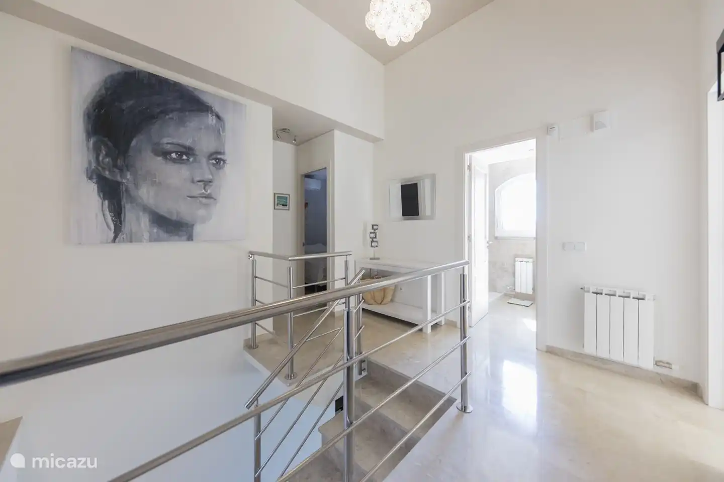 entrance of the villa with the bedrooms and bathrooms