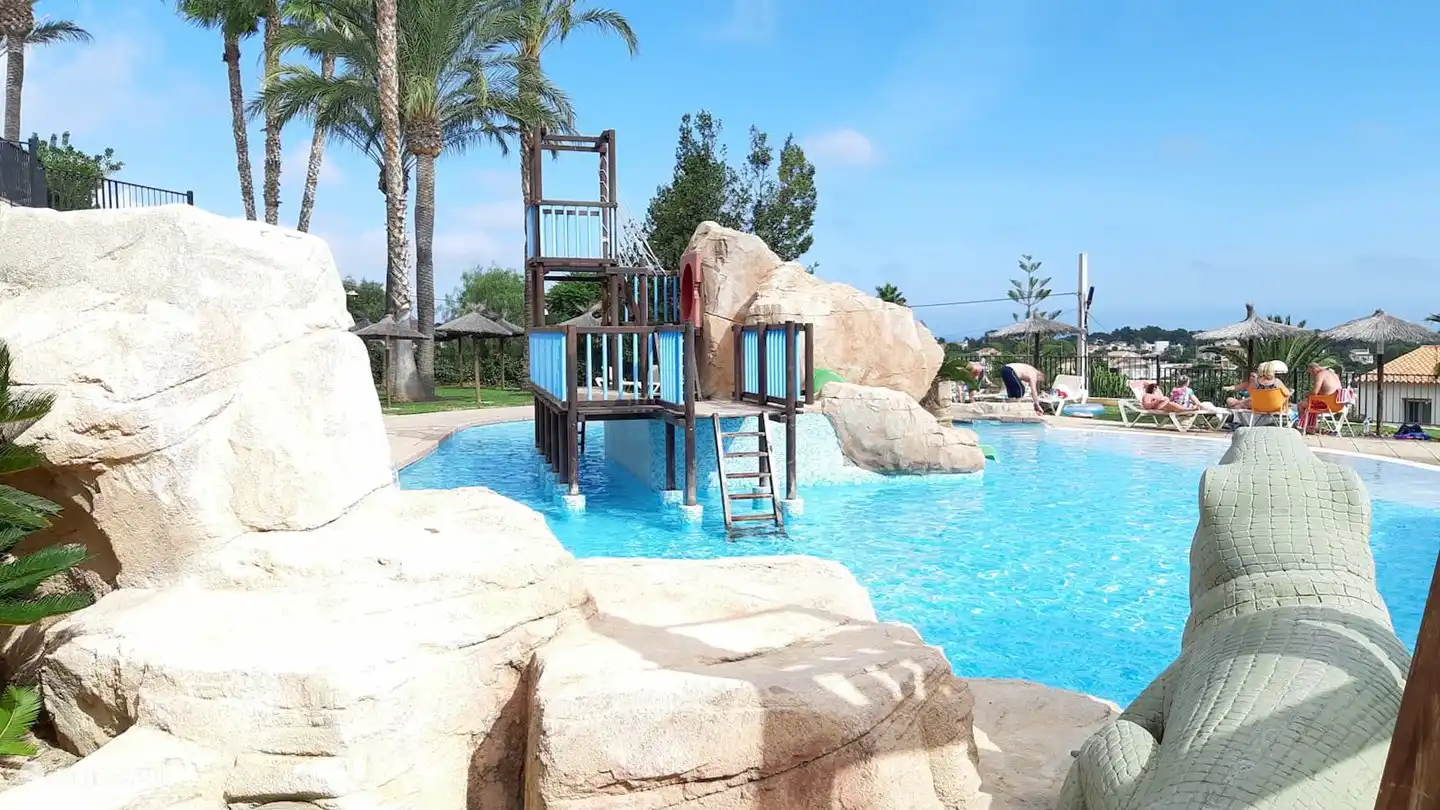 Swimming pool with pool bar