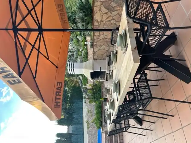 Terrace with dining table and 8 chairs