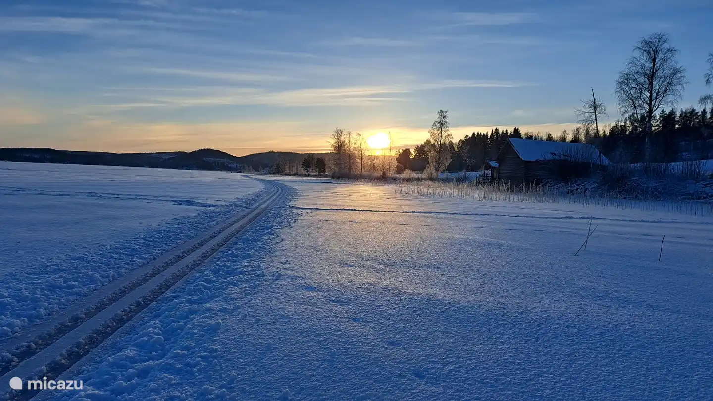 Stand van de zon om 12u30 vanaf het meer