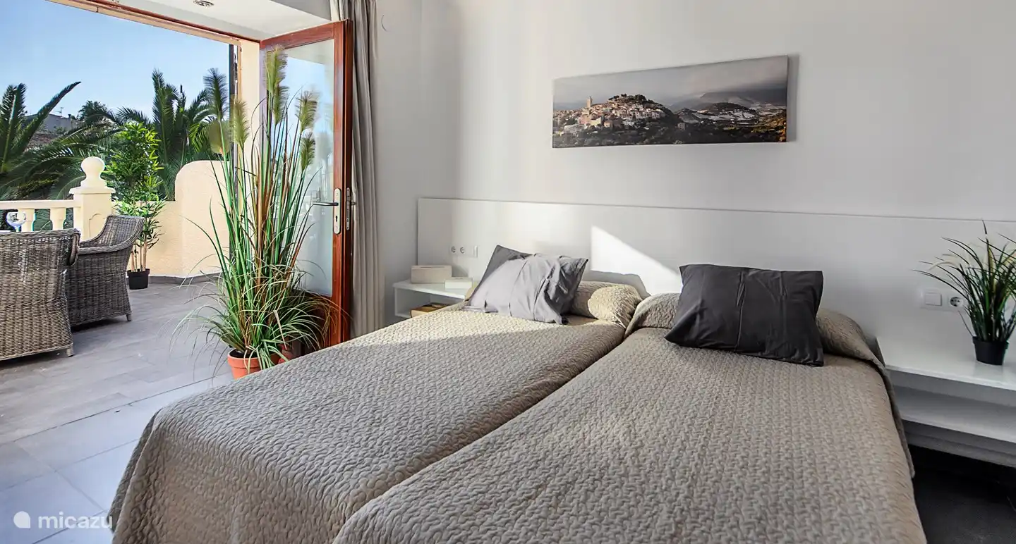 Bedroom with en-suite bathroom and air conditioning