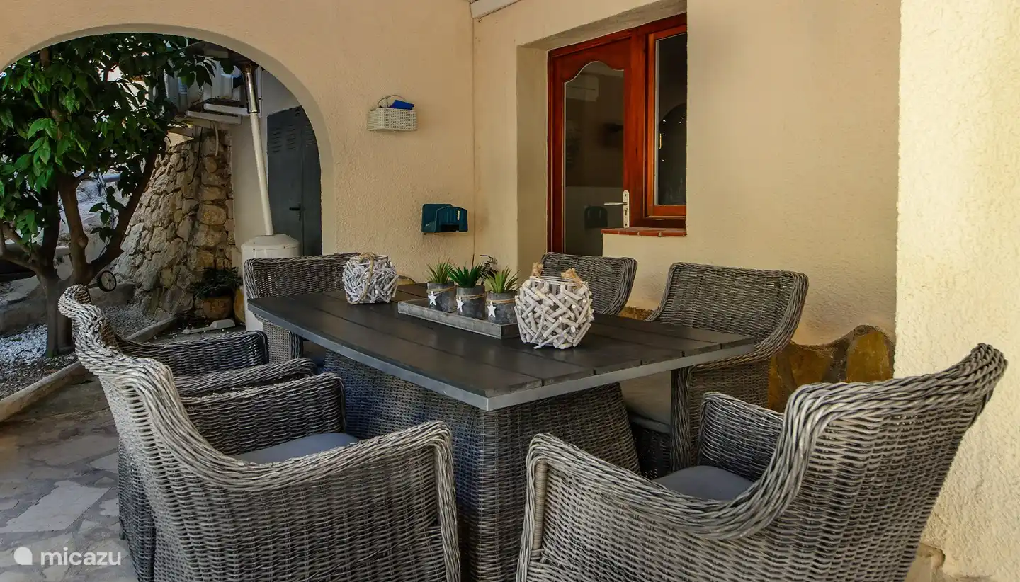 Barbecue with table and chairs