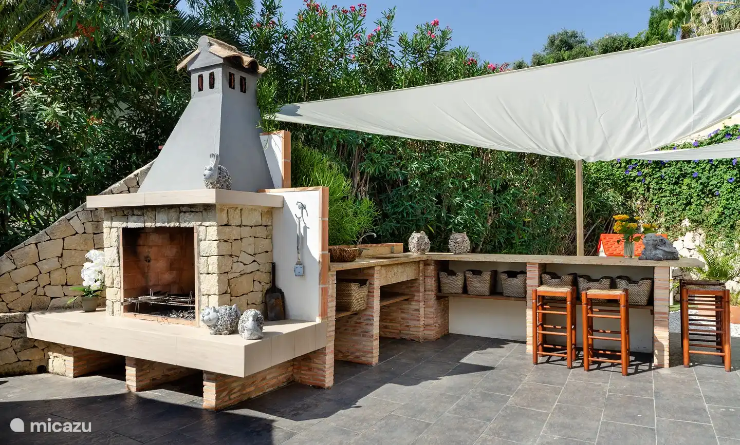 Barbecue with table and chairs