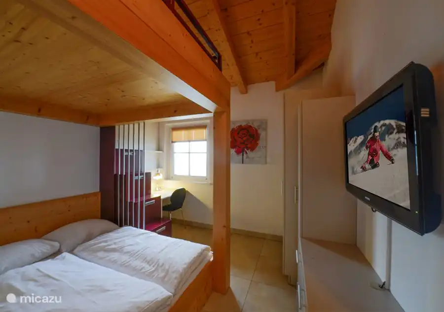 There are three luxurious bedrooms, one of which has a bunk bed.