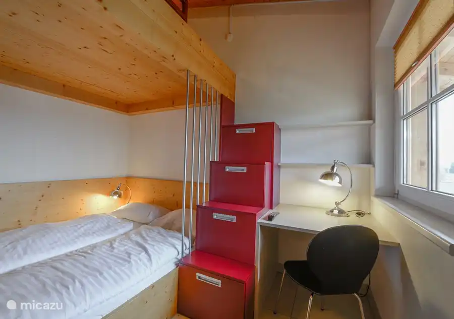 There are three luxurious bedrooms, one of which has a bunk bed.